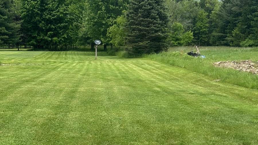 Mowing stripes on a maintained lawn in Akron, NY