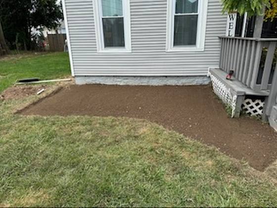 Graded and prepared soil before a bed install in Akron, NY
